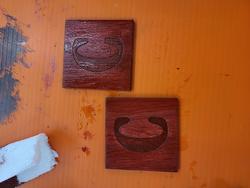 Pieces of engraved wood to test the paint/varnish.